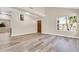 Home interior displaying spacious living area, modern design and wood flooring at 6837 S Roosevelt St, Tempe, AZ 85283