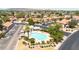 Community pool surrounded by well-maintained landscaping in a neighborhood setting at 6837 S Roosevelt St, Tempe, AZ 85283