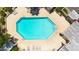Aerial view of a community pool with lounge chairs and shaded pergola areas at 6837 S Roosevelt St, Tempe, AZ 85283