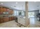 Gourmet kitchen features stainless appliances and a large center island at 6847 S 27Th Pl, Phoenix, AZ 85042