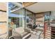 Cozy balcony with comfortable seating and sliding glass doors, creating a seamless indoor-outdoor living experience at 7121 E Rancho Vista Dr # 6001, Scottsdale, AZ 85251
