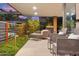 Balcony featuring modern patio furniture and lush landscaping at 7121 E Rancho Vista Dr # 6001, Scottsdale, AZ 85251