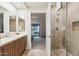 Stylish bathroom featuring a glass-enclosed shower and modern vanity at 7121 E Rancho Vista Dr # 6001, Scottsdale, AZ 85251