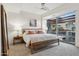 Bright bedroom featuring a large window and modern decor at 7121 E Rancho Vista Dr # 6001, Scottsdale, AZ 85251