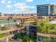 Exterior view featuring multiple balconies with stylish seating areas and greenery, offering stunning city views at 7121 E Rancho Vista Dr # 6001, Scottsdale, AZ 85251