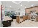 Modern open-concept kitchen with granite countertops, stainless steel appliances, and island at 7121 E Rancho Vista Dr # 6001, Scottsdale, AZ 85251