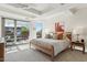 Bright bedroom features a king bed, balcony access, and scenic views, creating a tranquil and inviting space at 7121 E Rancho Vista Dr # 6001, Scottsdale, AZ 85251