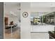 Open-concept living space featuring a dining area leading to a lounge area with a large sofa with community views at 7121 E Rancho Vista Dr # 6001, Scottsdale, AZ 85251