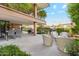 Inviting outdoor patio with cozy seating, dining area, and a built-in grill, perfect for entertaining at 7121 E Rancho Vista Dr # 6001, Scottsdale, AZ 85251