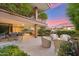 Inviting outdoor patio with cozy seating, dining area, and a built-in grill, perfect for entertaining at 7121 E Rancho Vista Dr # 6001, Scottsdale, AZ 85251