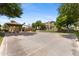 Outdoor basketball court with basketball hoop and a covered picnic area for neighborhood residents to enjoy at 753 N Port Dr, Gilbert, AZ 85233