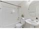 Bright bathroom featuring tub, shower, toilet and sink at 753 N Port Dr, Gilbert, AZ 85233