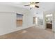 Bonus room featuring vaulted ceilings, carpet floors, and lots of natural light at 753 N Port Dr, Gilbert, AZ 85233