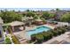 Aerial view of the community pool and surrounding playground and picnic area at 753 N Port Dr, Gilbert, AZ 85233