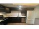 Modern kitchen with stainless steel appliances, subway tile backsplash, and granite countertops at 8050 E Oak St, Scottsdale, AZ 85257