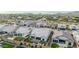 Birds eye view displays neighborhood homes, backyards, and common area, with views of the desert mountain range at 8127 E June St, Mesa, AZ 85207
