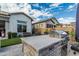 Backyard with a barbecue and cooking area, artificial turf and seating, perfect for outdoor gatherings and summer fun at 8127 E June St, Mesa, AZ 85207