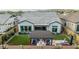 A full view of the spacious backyard featuring an inviting pergola, seating, and lush greenery at 8127 E June St, Mesa, AZ 85207