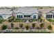 A beautiful outdoor space with a pergola, patio furniture, lush green lawn, and a charming block wall at 8127 E June St, Mesa, AZ 85207