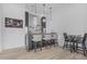 Stylish bar area featuring elegant lighting, decorative wall panels, and comfortable seating for entertaining guests at 8127 E June St, Mesa, AZ 85207