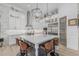 Well-equipped kitchen featuring white countertops, ample storage space, and a stainless steel oven and range at 8127 E June St, Mesa, AZ 85207