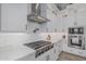 Updated kitchen featuring new appliances, light countertops, and clean cabinetry for a modern and functional space at 8127 E June St, Mesa, AZ 85207