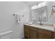This bathroom features a sleek vanity with a marble countertop and modern fixtures at 8430 E Fairmount Ave, Scottsdale, AZ 85251