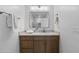 This bathroom features a sleek vanity with a marble countertop and modern fixtures at 8430 E Fairmount Ave, Scottsdale, AZ 85251