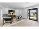 Bright living room with sleek furniture, neutral tones, a stylish rug, and an inviting atmosphere at 8430 E Fairmount Ave, Scottsdale, AZ 85251