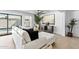 Comfortable living space featuring plush furniture, stylish decor, tile flooring, and abundant natural light at 8430 E Fairmount Ave, Scottsdale, AZ 85251
