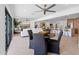 Bright and open living room with modern decor and seamless transition to the kitchen at 8430 E Fairmount Ave, Scottsdale, AZ 85251