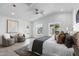 Stylish bedroom featuring an airy layout, neutral tones, and views of the pool and backyard at 8430 E Fairmount Ave, Scottsdale, AZ 85251