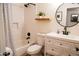 Bathroom featuring a shower, toilet, and vanity at 864 W Monte Ave, Mesa, AZ 85210