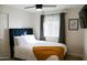 Cozy bedroom featuring soft lighting and calming color palette at 864 W Monte Ave, Mesa, AZ 85210