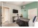 Bedroom with a comfortable bed, gaming setup, and neutral color scheme at 875 S Nebraska St # 69, Chandler, AZ 85225