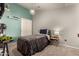 Bedroom with a comfortable bed, stylish nightstand, and neutral color scheme at 875 S Nebraska St # 69, Chandler, AZ 85225