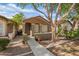 Attractive one-story house with front yard plants and desert landscaping at 875 S Nebraska St # 69, Chandler, AZ 85225