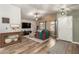 Bright living room showcasing hardwood floors, a ceiling fan, and a cozy seating area at 875 S Nebraska St # 69, Chandler, AZ 85225