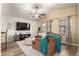 Cozy living room featuring a ceiling fan, wood floors and lots of natural light at 875 S Nebraska St # 69, Chandler, AZ 85225