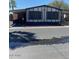 Charming manufactured home with two-car covered parking in well-maintained community at 9427 E University Dr # 48, Mesa, AZ 85207