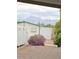 Exterior view of a home with a purple bush in front and mountains in the background at 9427 E University Dr # 48, Mesa, AZ 85207