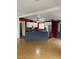 Spacious kitchen with white cabinets, stainless steel appliances, and an island with bar seating at 9427 E University Dr # 48, Mesa, AZ 85207