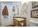 Bathroom with sink, mirror, and cabinet at 9967 W Devonshire Ave, Phoenix, AZ 85037