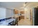 Cozy kitchen featuring wooden cabinets, a tile floor and stainless steel appliances at 9967 W Devonshire Ave, Phoenix, AZ 85037