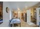 Open concept eat-in kitchen featuring a dining table and stainless steel appliances at 9967 W Devonshire Ave, Phoenix, AZ 85037