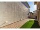 Private backyard with pavers, small sections of artificial turf and an intimate outdoor space at 999 S Sabino Dr, Gilbert, AZ 85296