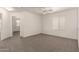Carpeted bedroom featuring large windows for abundant natural light at 999 S Sabino Dr, Gilbert, AZ 85296