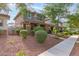 Attractive home exterior with neat landscaping, healthy plants, and a walkway at 999 S Sabino Dr, Gilbert, AZ 85296