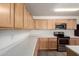 Close-up of the kitchen featuring stainless steel appliances and ample counter space at 999 S Sabino Dr, Gilbert, AZ 85296
