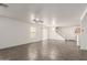 Spacious living room featuring tile flooring, a ceiling fan, and plenty of natural light at 999 S Sabino Dr, Gilbert, AZ 85296